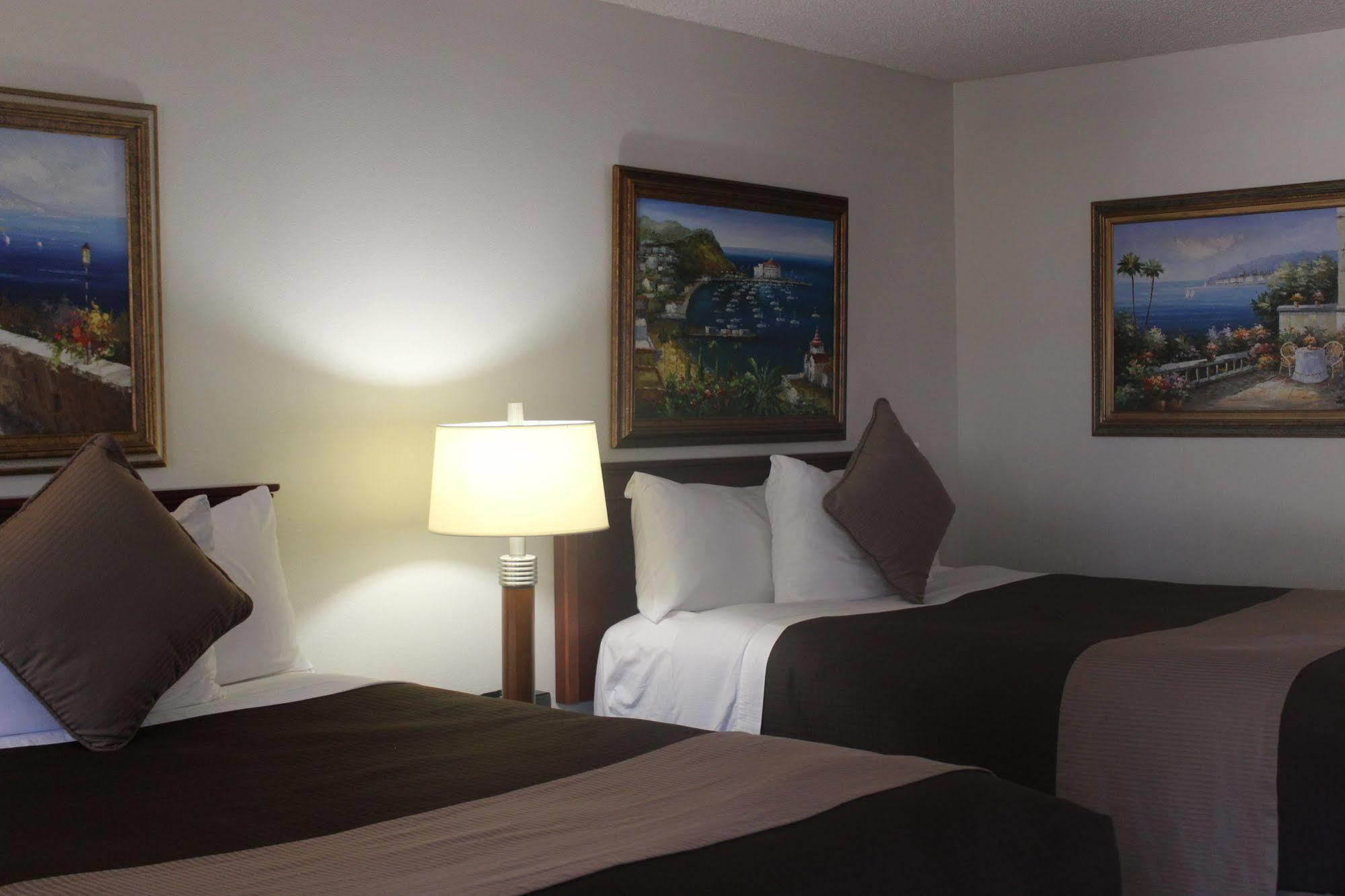 O'Cairns Inn And Suites Ломпок Екстериор снимка